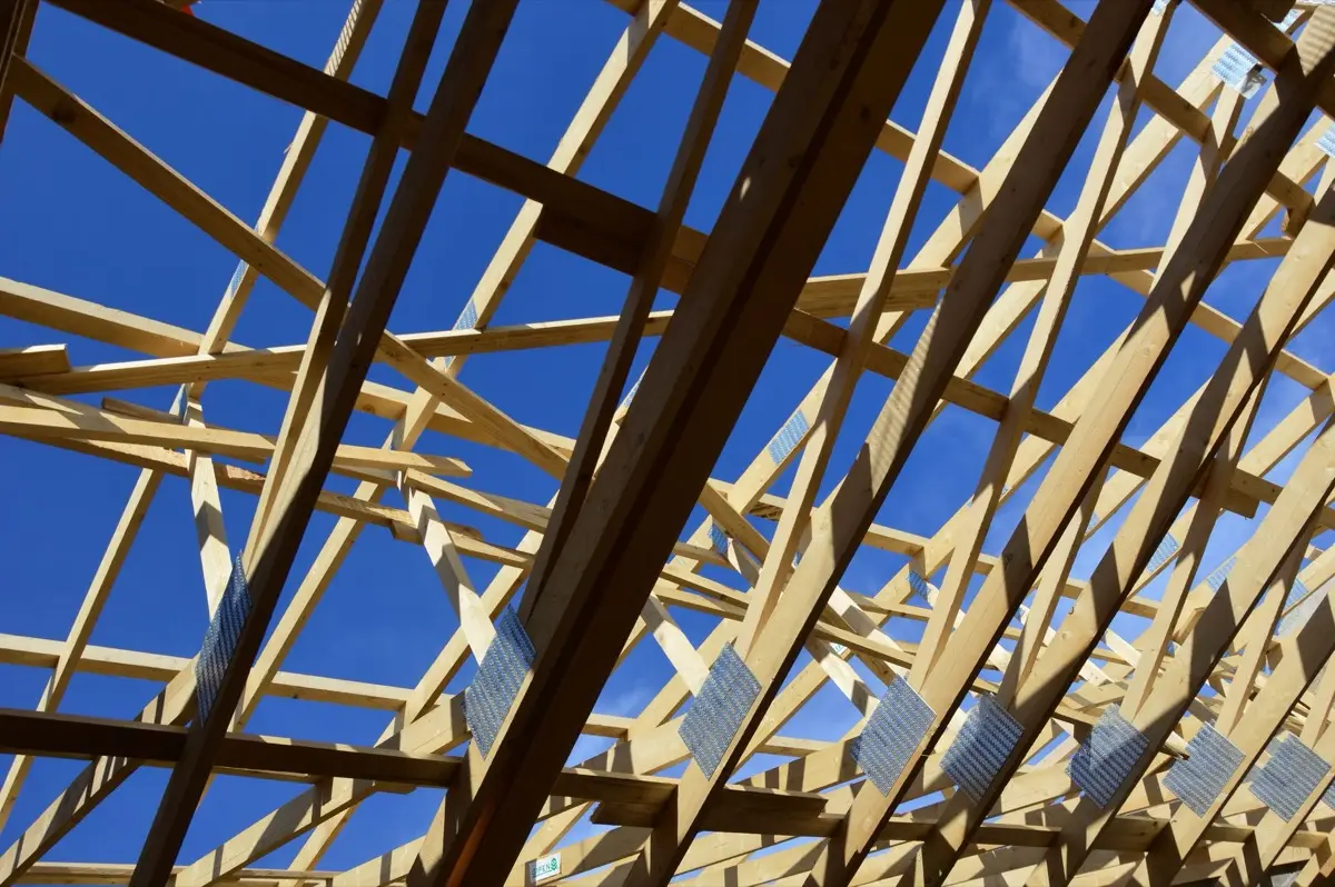 Bare rafters and panel decking on a house in Frederick, MD before the covering goes back on